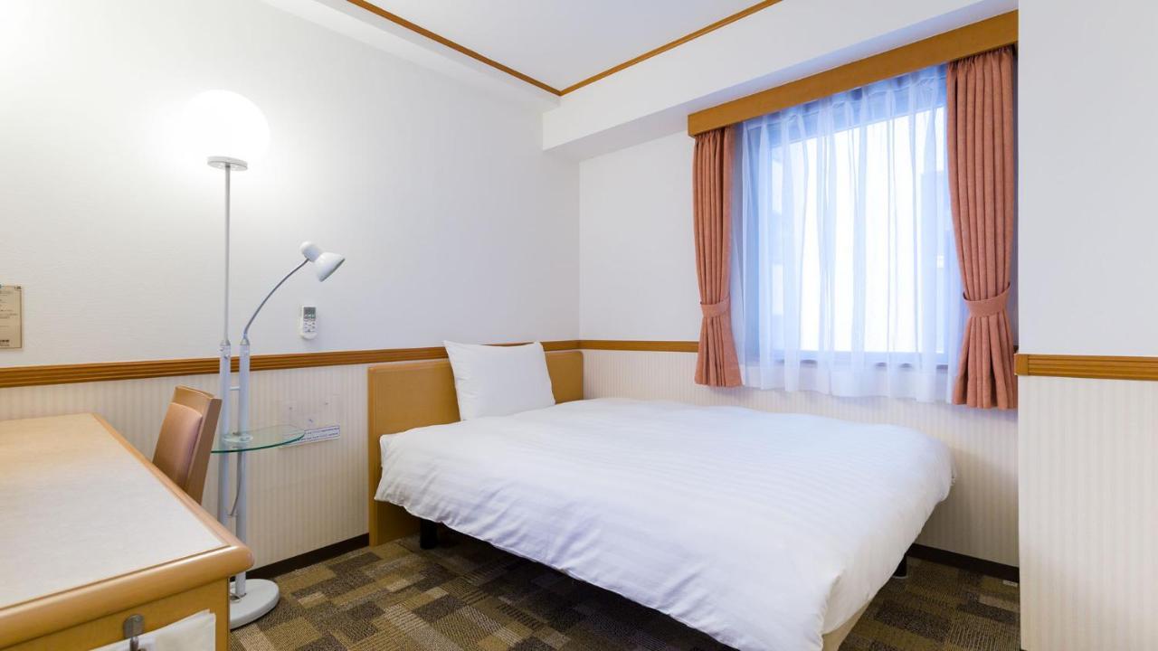 Toyoko Inn Nishitetsu Kurume Eki Higashi Guchi Esterno foto